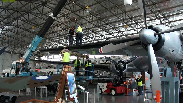 f27d Crews move cranes into place