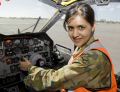 Flight Lieutenant Aganjot Sidhu from 10 Squadron sitting in the cockpit of a former RAAF Neptune.